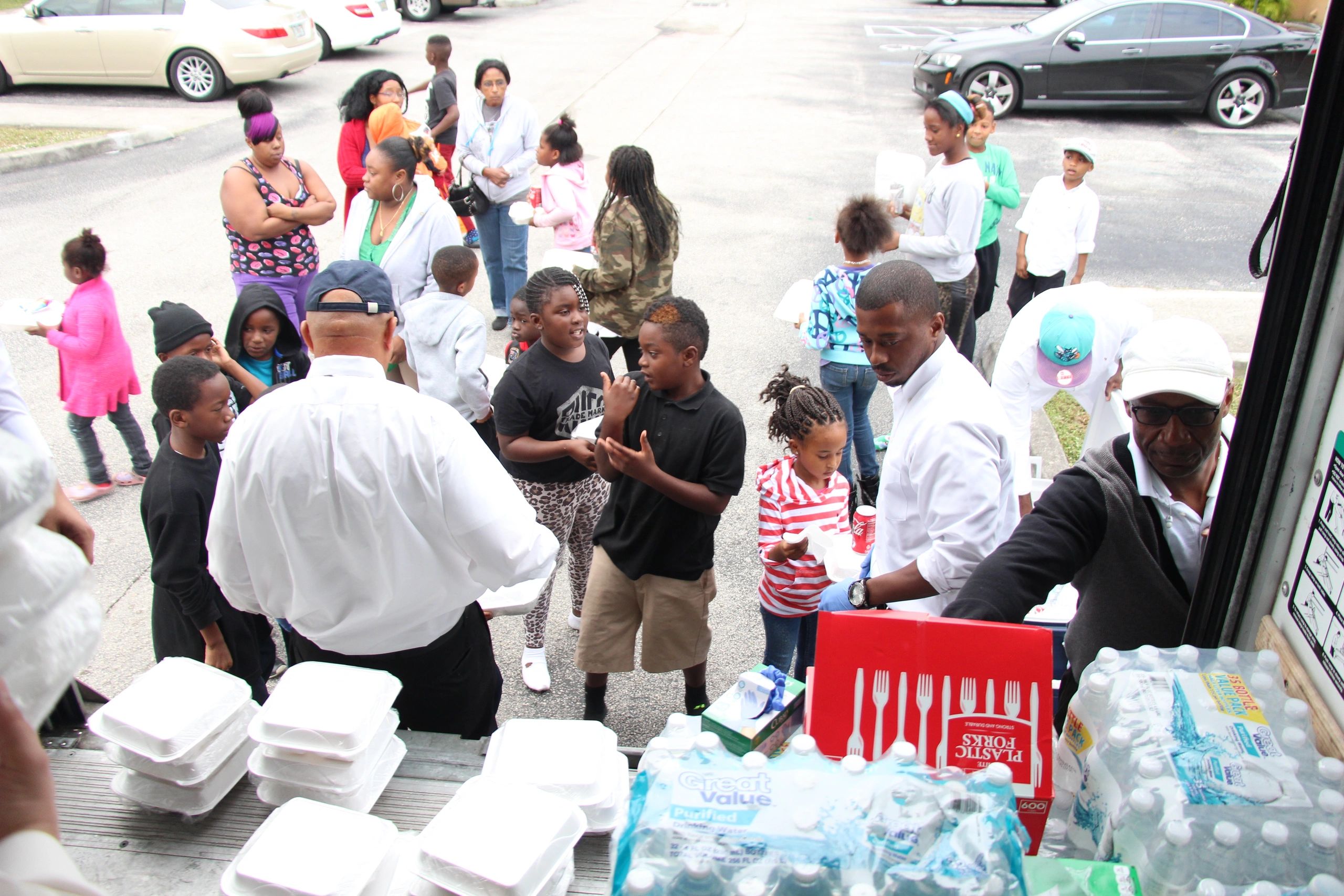 Community food distribution event with volunteers