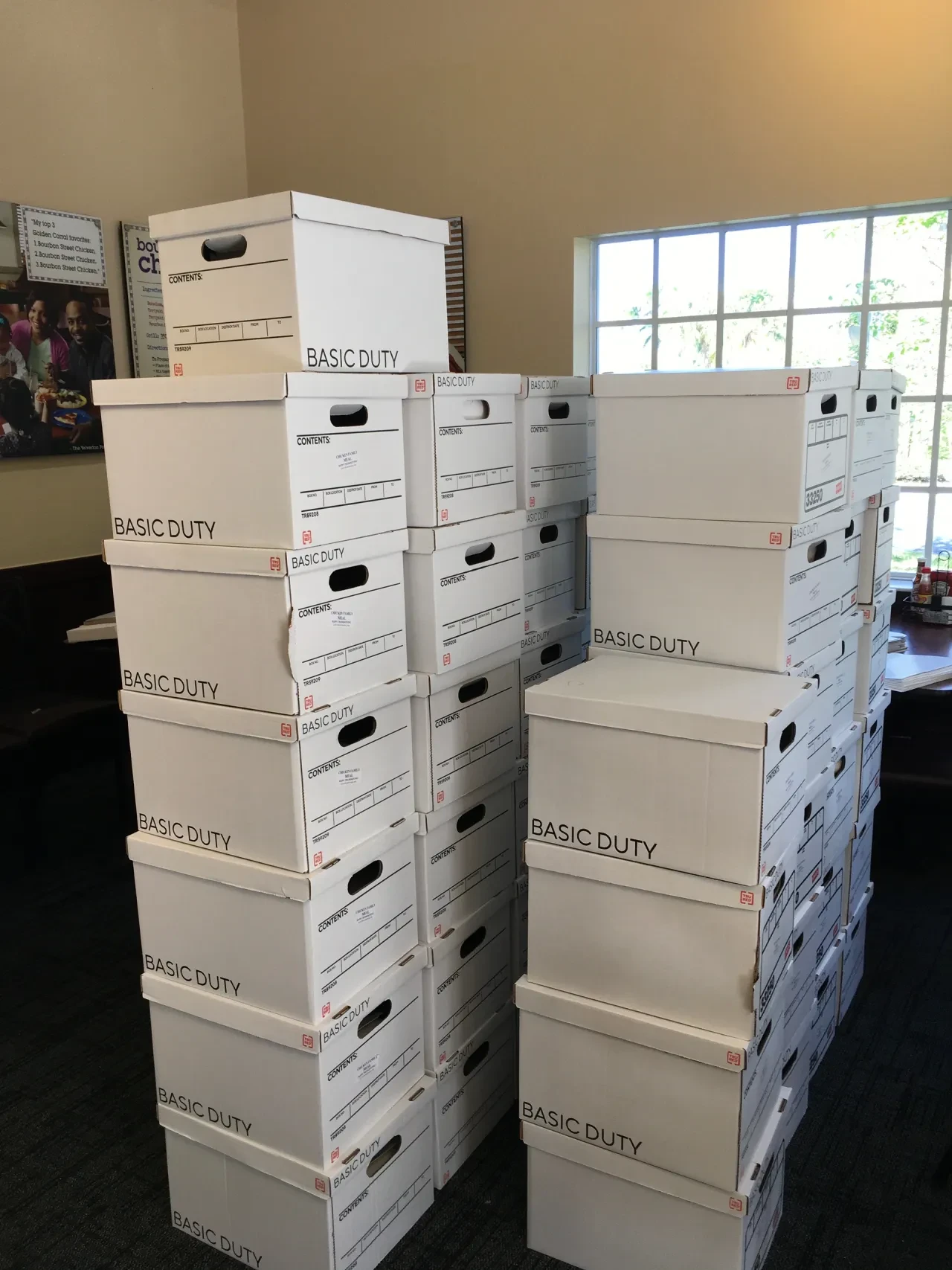 Stacked Basic Duty boxes ready for distribution