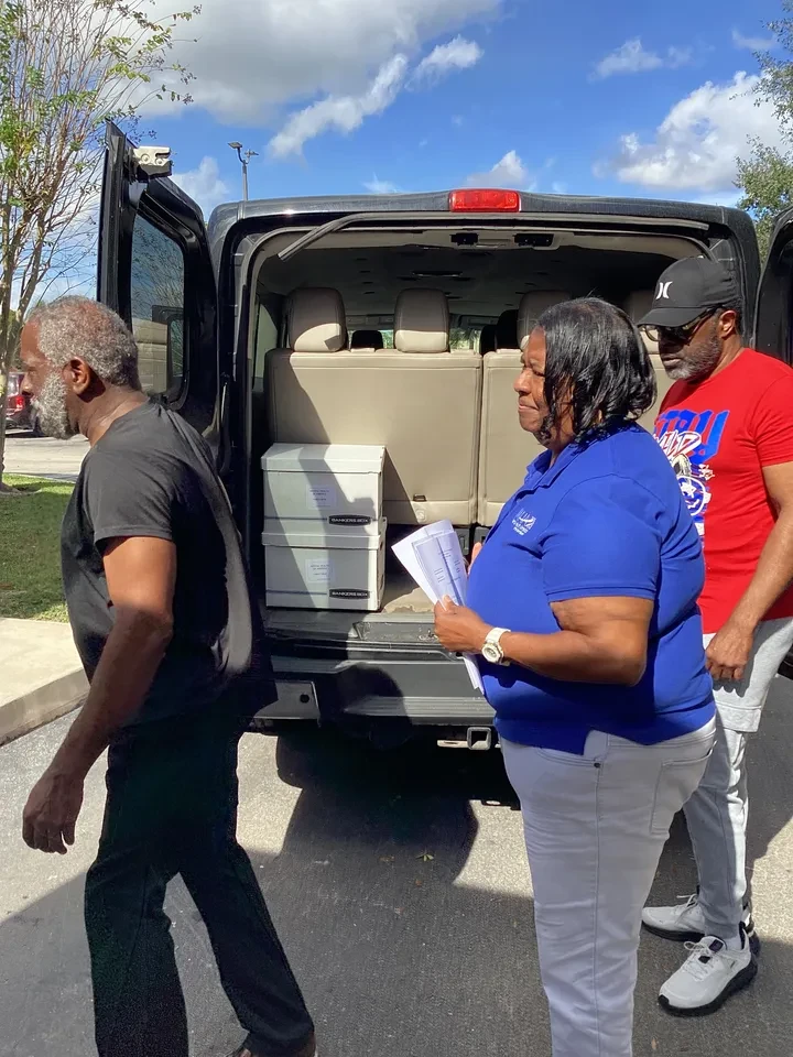 Volunteers coordinating food box delivery